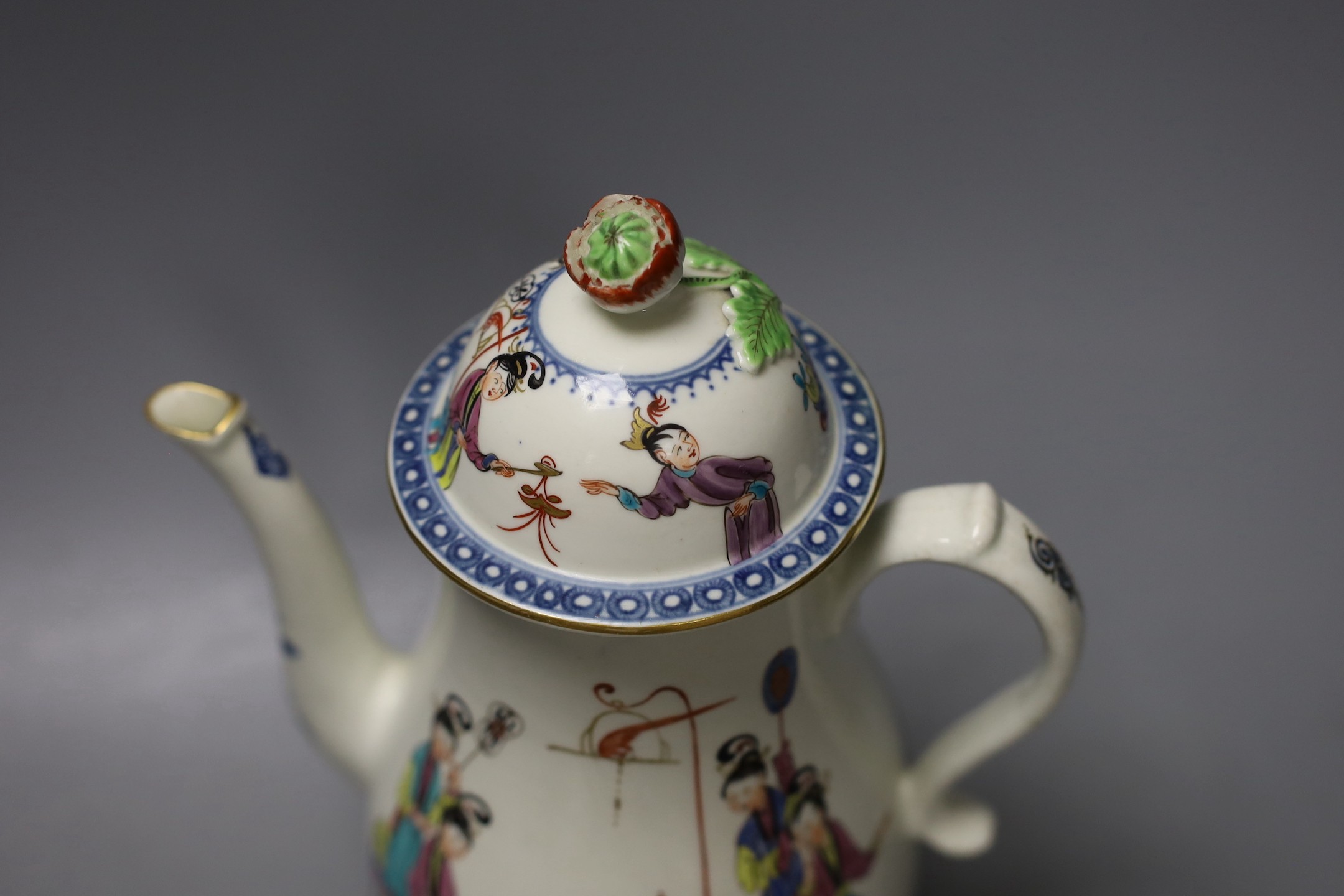 A Worcester coffee pot and cover painted with oriental figures in various pursuits circa 1772, 24cm high.